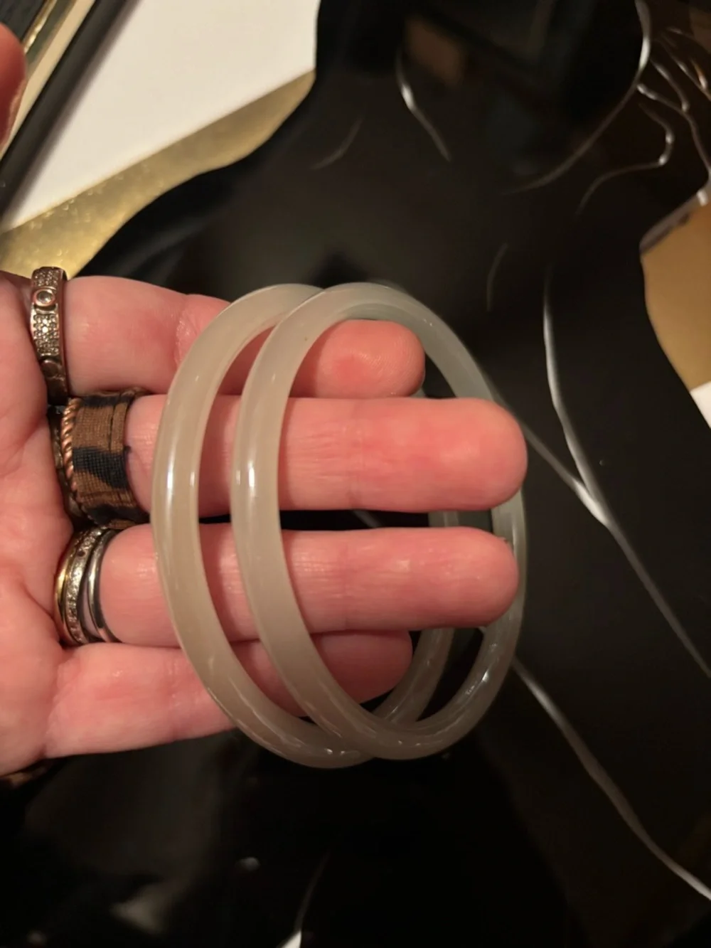 2 White Jade Bangle Bracelets and a Jade, Garnet, and Pearl Beaded Necklace